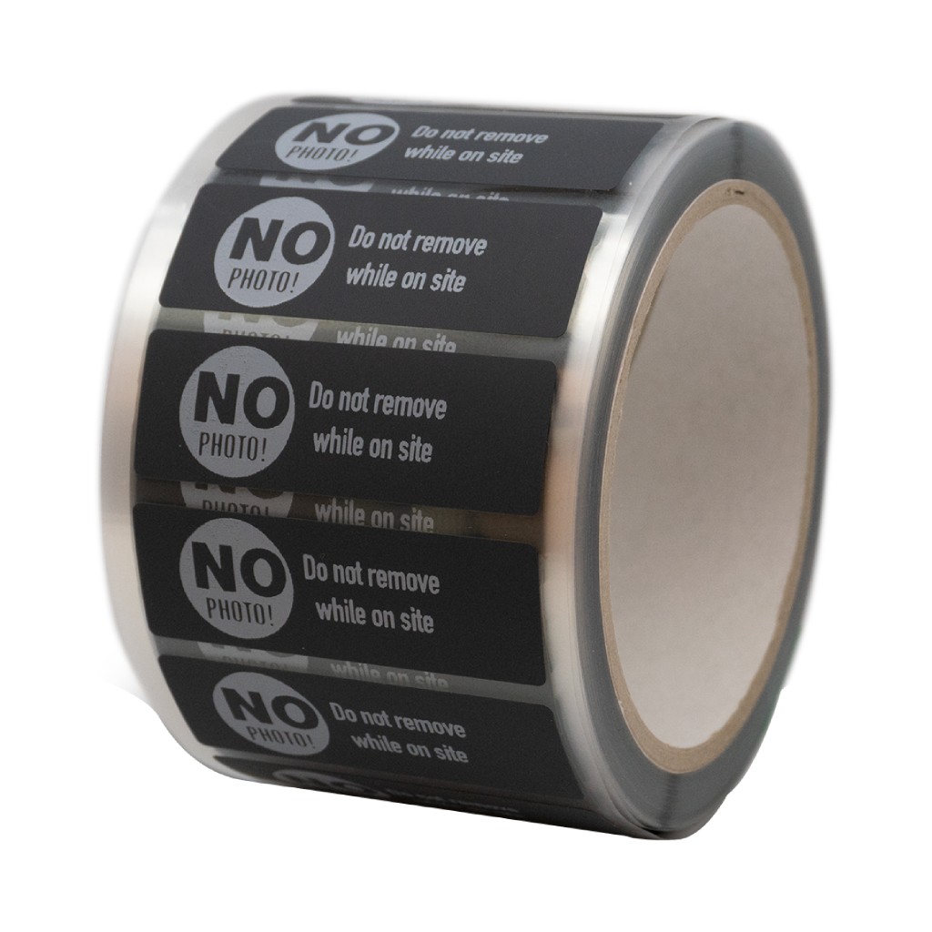 Hover om in te zoomen | Klik om te vergroten EtiRoll VOID - Etiketten 60 x 20 mm - mat zwart polyester voor TT - zonder kleefstofoverdracht - Voo r GSM - Rol 76/102 mm - 1000 st/rol